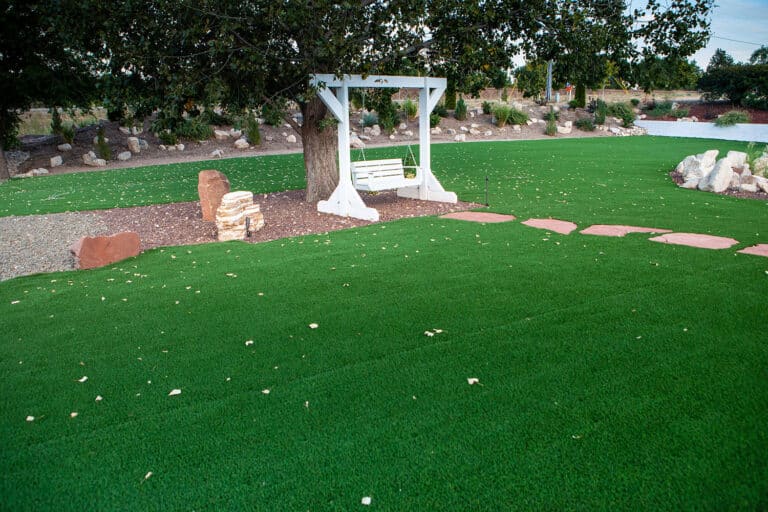 Zebrascapes turf installation with a backyard swing