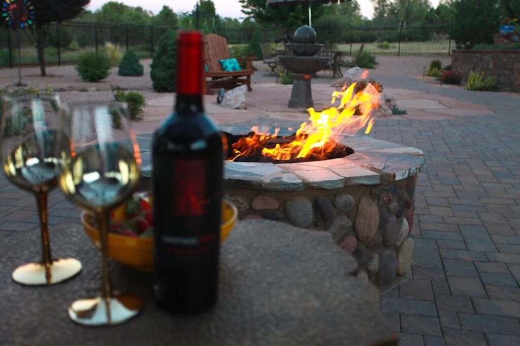 Fire-pit-with-wine-picture.-Outdoor-Living-Spaces-prescott zebrascapes